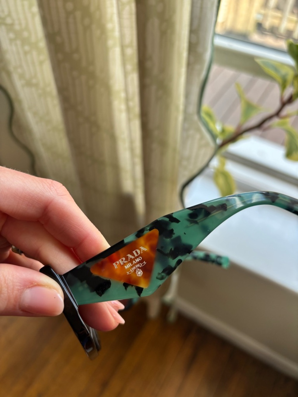 Prada Green Tortoise Sunglasses with Gold Logo